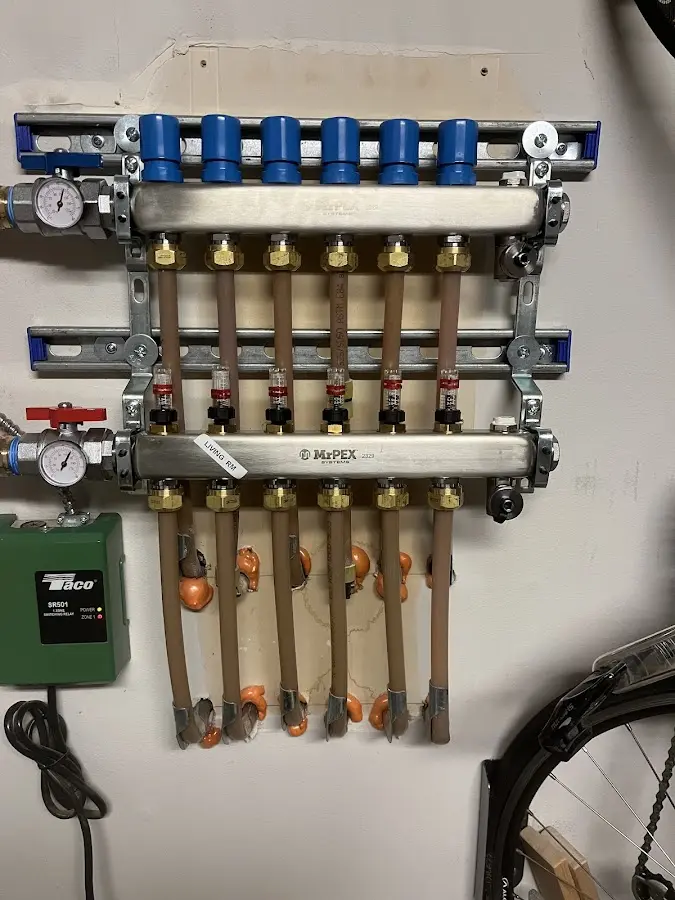 Plumber performing Water Heater Repair at a residential property in Lackawaxen